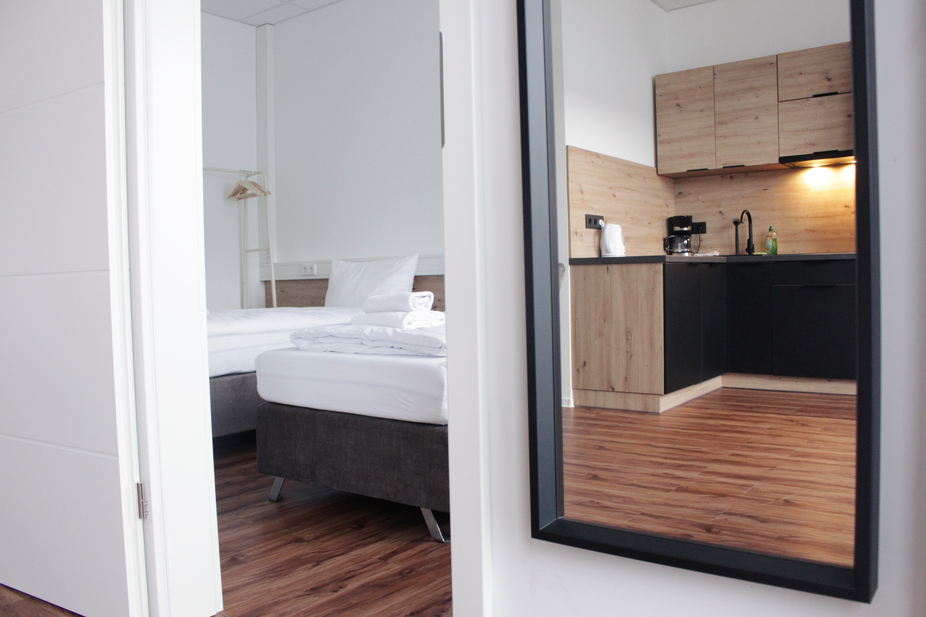 Hive Apartments Kueche Schlafzimmer